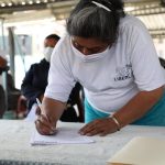 Firma de convenio ACDC y comerciantes calle Loja