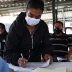 Firma de convenio ACDC y comerciantes calle Loja