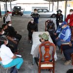 Firma de convenio ACDC y comerciantes calle Loja